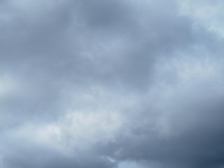 Gray sky covered by cloudy dense clouds in graying day - sky landscape