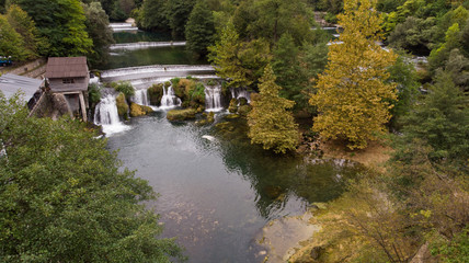 river slopes and autumn colors on trees 