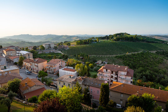 View on the houses, vineyards and hills of the historic Italian village of Cossignano