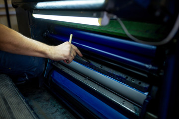 The master have service an industrial offset printing press machine. The process of tuning the...