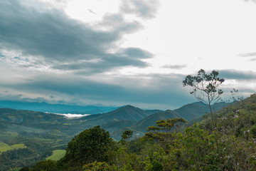 THE MOUNTAINOUS LANDSCAPE AT DAWN
