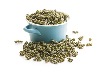 Uncooked colorful pasta with spinach flavor