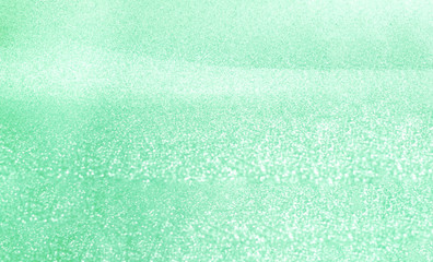 Festive mint color background with sparkling glitter