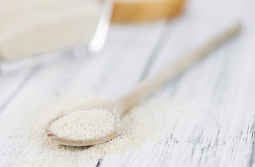 Vintage wooden table with Bread Crumbs (selective focus; close-up shot)