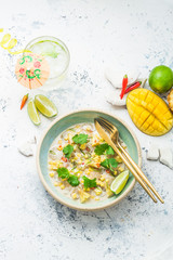 Scallops crudo with mango and pineapple in coconut milk, thai style, copy space