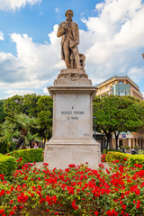 Fototapeta na wymiar Italy, Apulia, Metropolitan City of Bari, Bari. 22 May, 2019. Statue of Niccolo Piccinni. Italian composer and native of Bari. Sculpture by Gaetano Fiore in 1884.