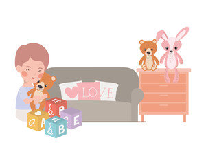 cute little boy baby playing with toys in living room
