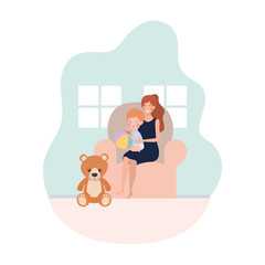 cute pregnancy mother with little boy seated in sofa