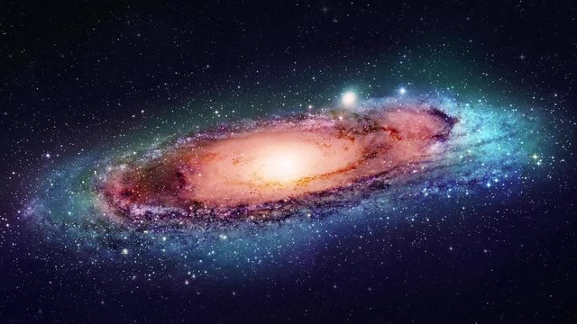 Travelling through star fields and spiral galaxies. 4K motion footage in a seamless loop.