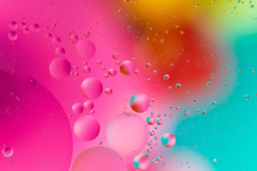 Abstract background, colorful gradient colors. Oil drops in water.