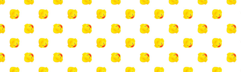 Yellow seamless pattern. Plastic toys Yellow rubber ducks.