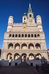The facade of the Renaissance town hall tower with clock in Poznan.