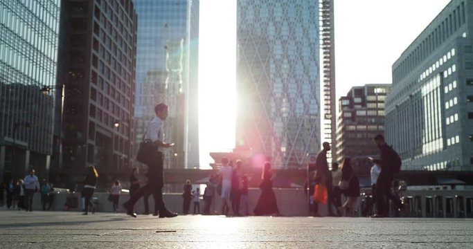 dockland commuters business people rush hour sunset