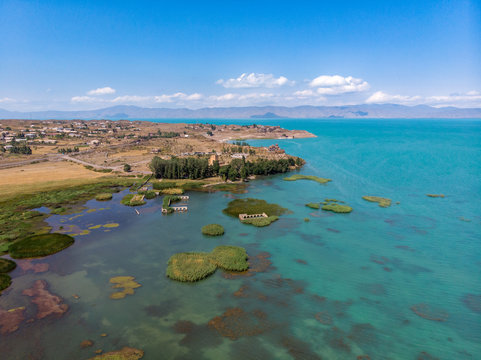Hayravank monastery on the shores of the blue lake Sevan in Armenia. Aerial view panoramic
