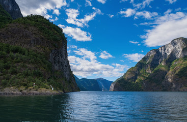 Fototapeta na wymiar The Aurlandsfjord - a narrow, lush branch of Norway’s longest fjord, the Sognefjord. July 2019