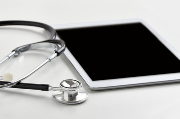 stethoscope and digital tablet