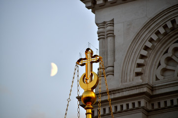 Fototapeta na wymiar Top of the church with moon