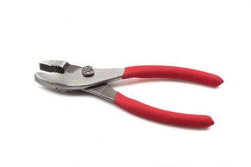 A close up image of a pair of red handled pliers isolated on a white background