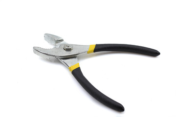 Obraz premium A close up image of a pair of black and yellow handled pliers isolated on a white background