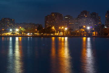 Fototapeta na wymiar a wide long exposure cityscape shoot from izmir city - dark pastel colors