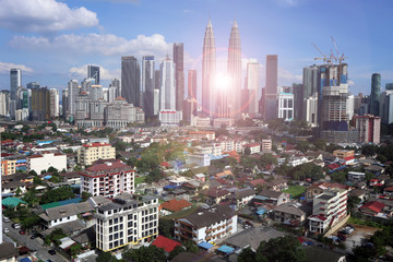 Kuala Lumpur skyline over blue sky