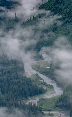 Fototapeta na wymiar Fog Hangs Low Over Valley River