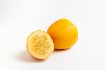 Fresh tropical fruit: cocona, white background