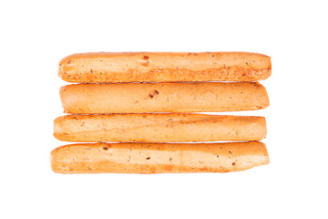 Bread sticks isolated on white background. Grissini, Italian breadsticks with onions and herbs. Top view.