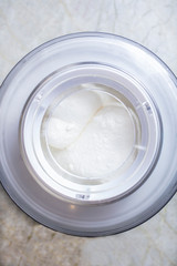 Vanilla ice cream being whiped in an ice cream machine