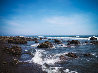 Natural Scenery Tropical Rocky Fishing Beach In The Sunny Morning At The Village, Umeanyar, North Bali, Indonesia