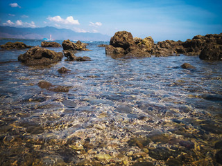 Clear Sea Water Among The Rocks Of Tropical Fishing Beach In The Sunny Morning At The Village, Umeanyar, North Bali, Indonesia