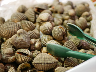 Selective focus of fresh cockles for sale in a supermarket