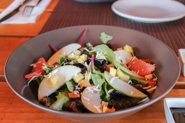Mediterranean salad with fruit and coconut