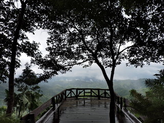 Fototapeta na wymiar Wooden balcony on the top of mountain