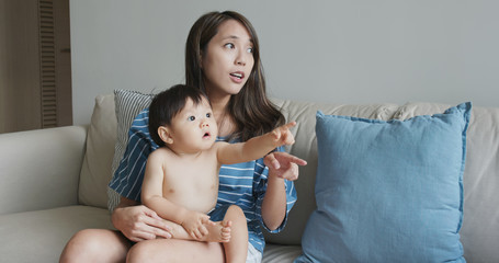 Fototapeta na wymiar Asian mum play with baby boy at home