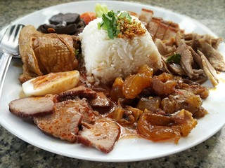 Rice with Chicken in Gravy Sauce, crispy pork belly, Thai Red BBQ Pork  and boiled egg
