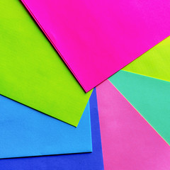 Neon paper samples colorful. Geometric trendy pattern, colored paper, bright colors.