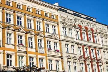 Facades of some renovated old apartment buildings seen in Prenzlauer Berg district in Berlin, Germany