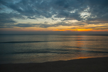 Naklejka na ściany i meble Siluette sunset at the beach background