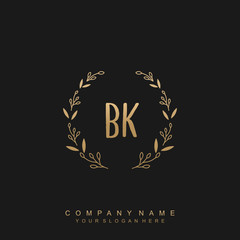letter BK surrounded by beautiful and elegant flowers and leaves. Wedding monogram logo template.