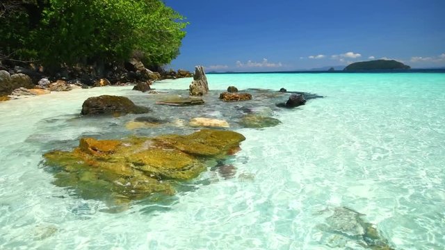 Tropical paradise beach of beautiful Nyaung Oo Phee island on sunny day in Myanmar