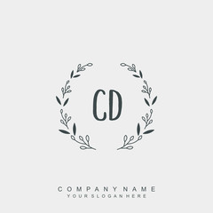 letter CD surrounded by beautiful and elegant flowers and leaves. Wedding monogram logo template.