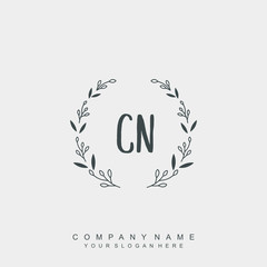 letter CN surrounded by beautiful and elegant flowers and leaves. Wedding monogram logo template.