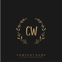 letter CW surrounded by beautiful and elegant flowers and leaves. Wedding monogram logo template.