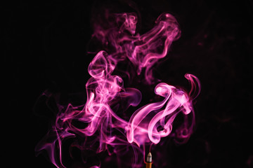 Incense stick smock on dark background 