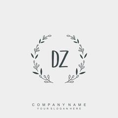 letter DZ surrounded by beautiful and elegant flowers and leaves. Wedding monogram logo template.