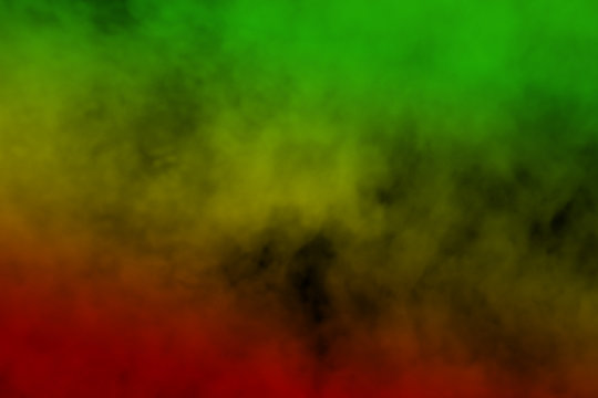 abstract background smoke curves and wave reggae colors green, yellow, red colored in flag of reggae music