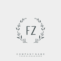 letter FZ surrounded by beautiful and elegant flowers and leaves. Wedding monogram logo template.