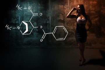 Sexy girl or secretary or female student presenting handdrawn chemical formula of cocaine