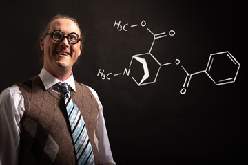 Professor presenting handdrawn chemical formula of cocaine